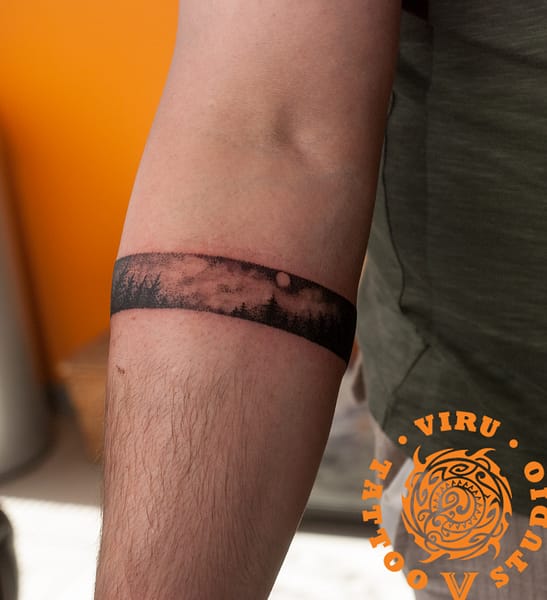 black braslet tattoo